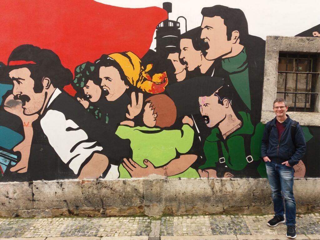 Mural depicting the Carnation Revolution that freed Portugal from its Fascist Government. During the Awkrick walking tour of Lisbon.